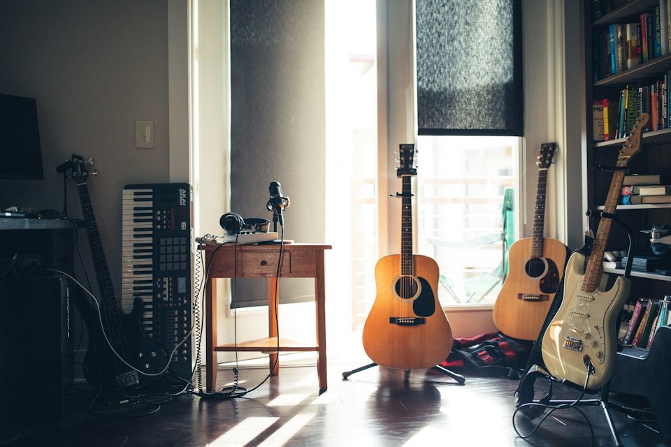 Music studio with instruments and production gear